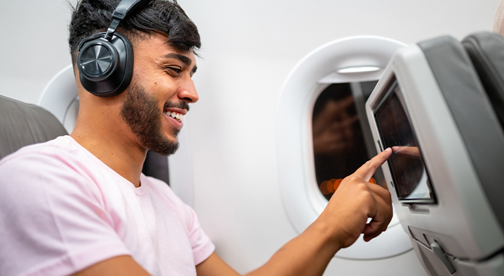 Films kijken in het vliegtuig Films kijken in het vliegtuig