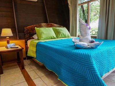 Hotel Faro Arenal bed