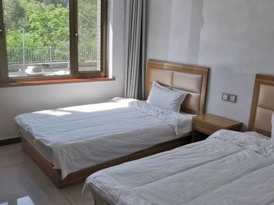 Xiurui Guesthouse at Jinshanling Great Wall - slaapkamer